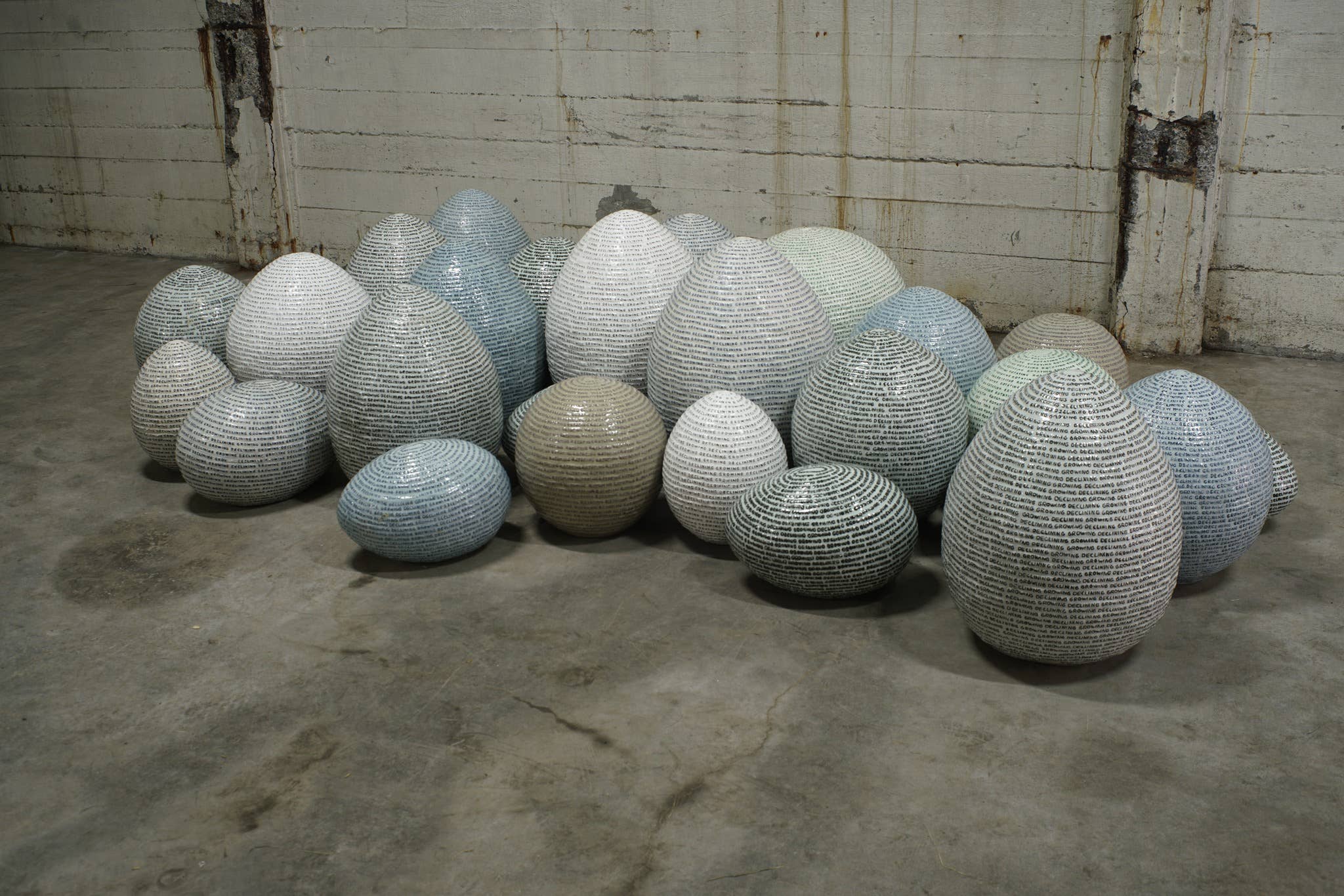 Sculptural egg forms displayed inside ARS LONGA Contemporary Art Museum in Djúpivogur.