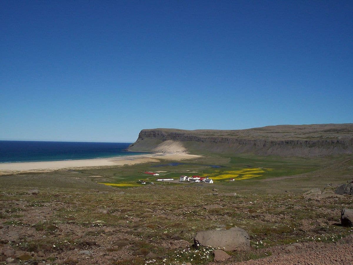 Breidavik Bay with pale sand and low Westfjords hills near Latrabjarg.