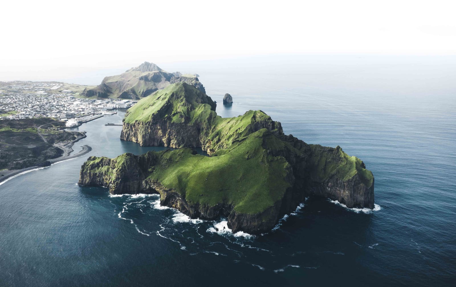 Panoramic view over Heimaey town and the Westman Islands near Herjolfstown.