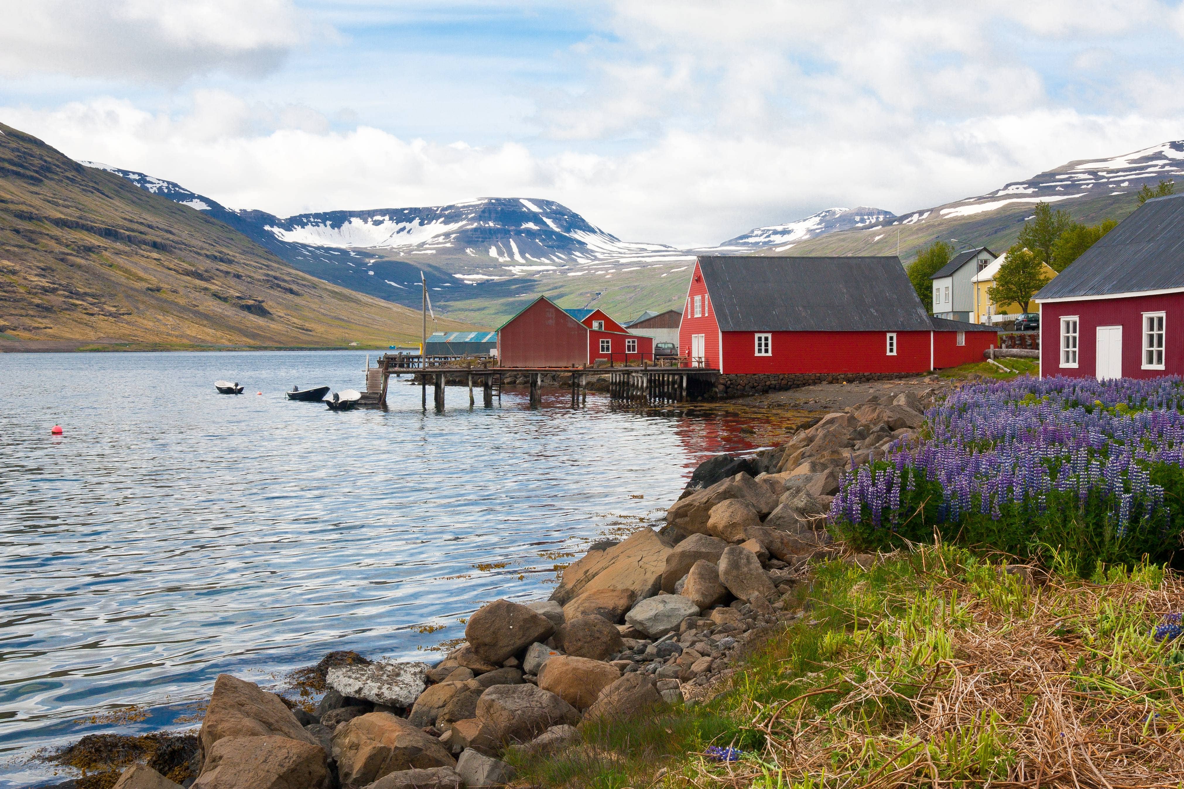 Eskifjörður coastline and fjord scenery below Hólmatindur in East Iceland.