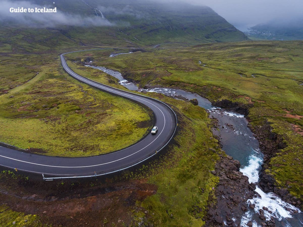 The winding Road 93 descent toward Seyðisfjörður below the Fjarðarheiði pass.