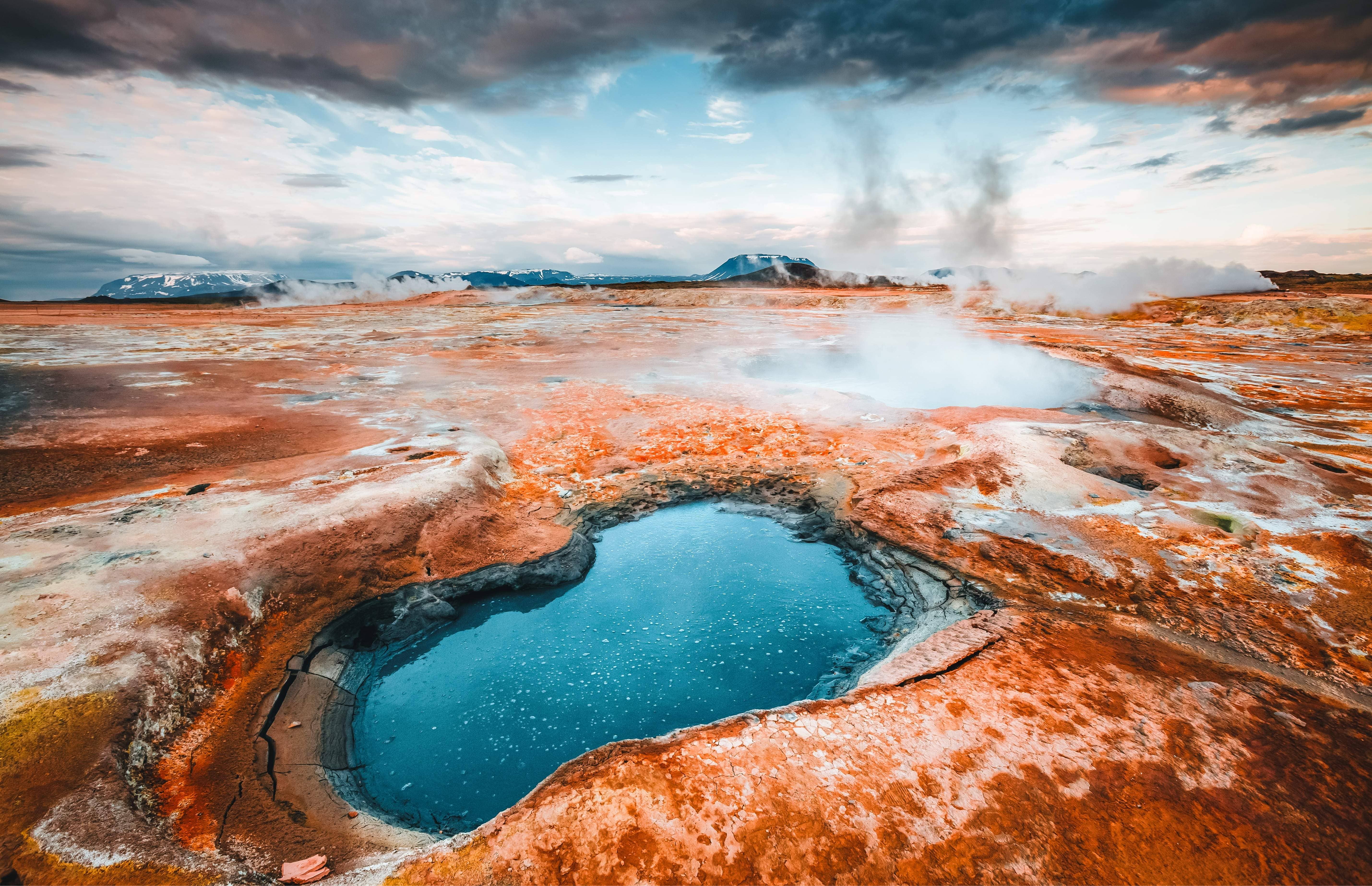 Boiling mud pool and steam vents at the Námafjall and Hverir geothermal area in North Iceland.