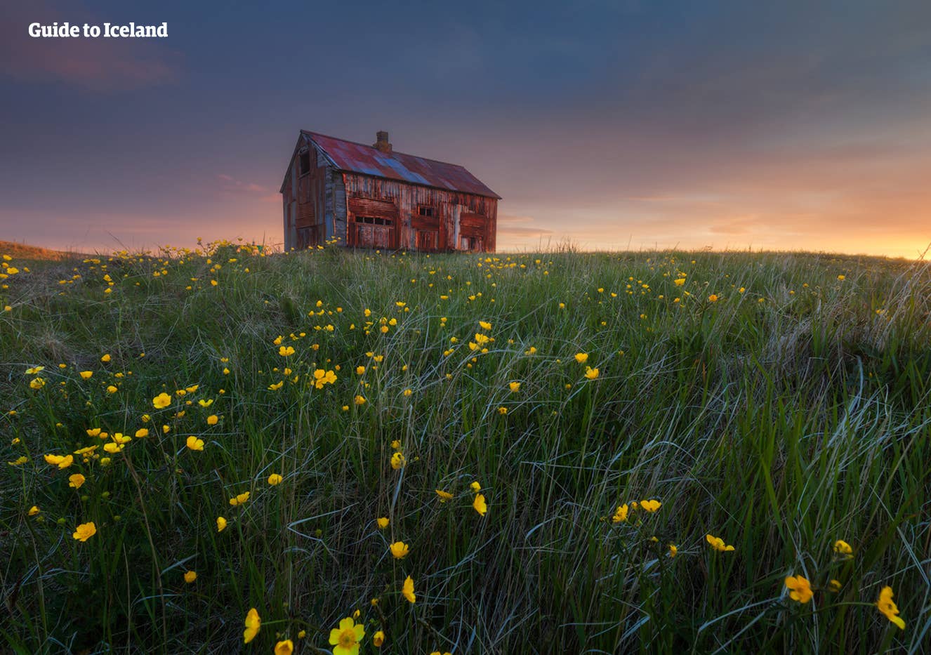 Abandoned house in green Reykjanes Geopark countryside.