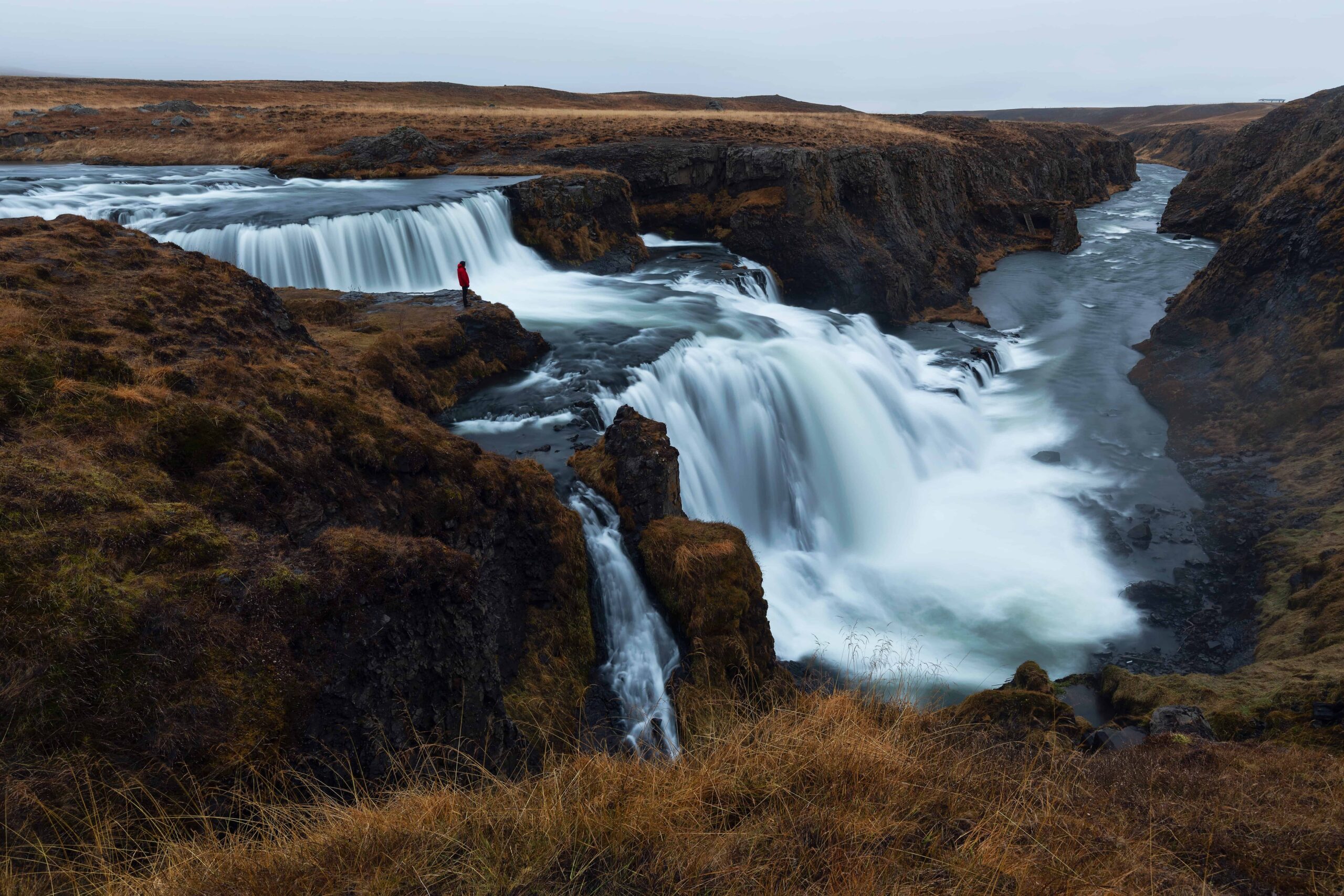 Reykjafoss waterfall cascading through a rocky river gorge near Varmahlid in North Iceland.