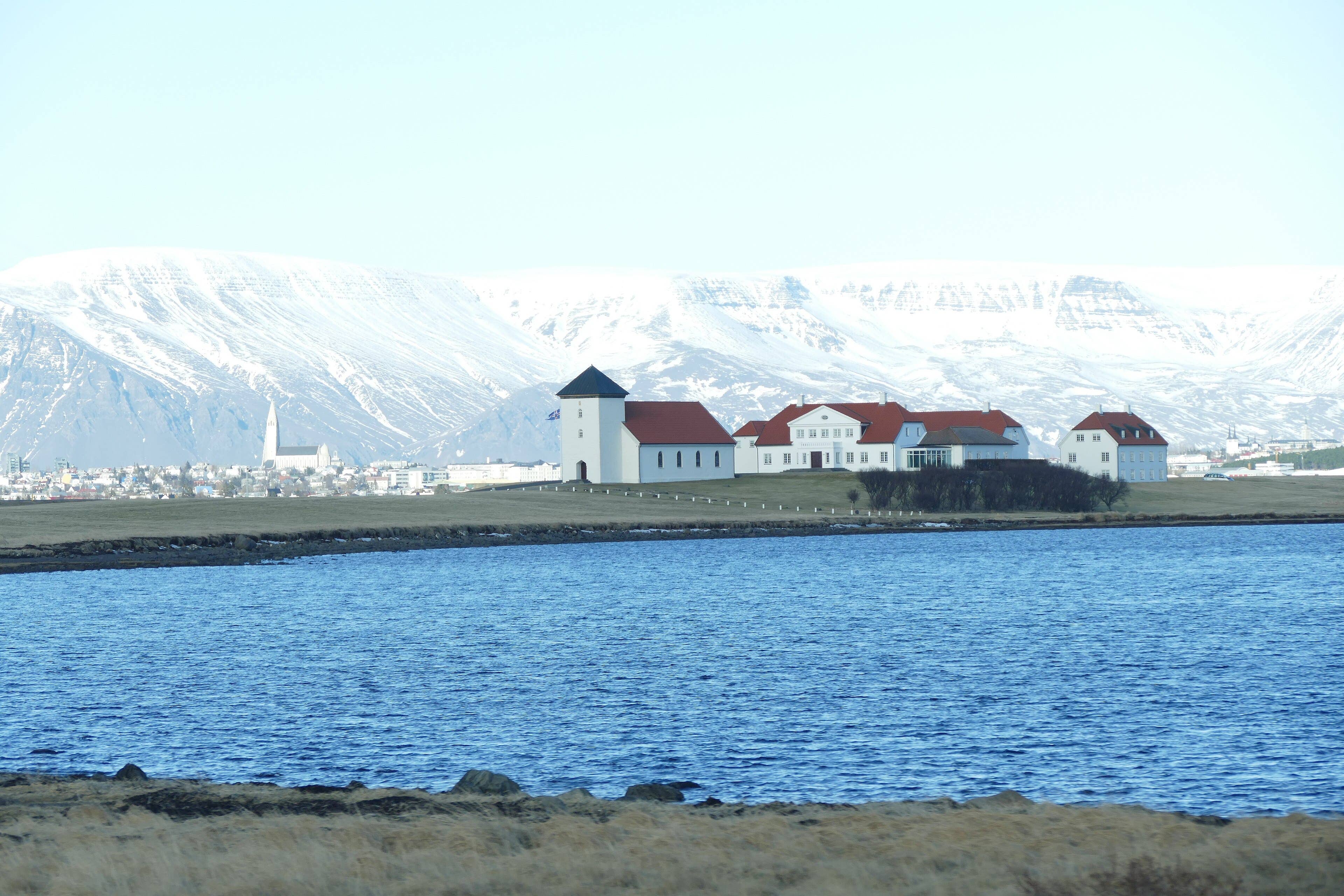 Low shoreline and Bessastaðir buildings within the Garðabær municipality.