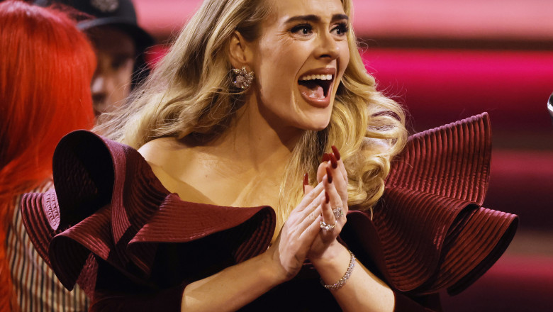  Adele o depășește pe Whitney Houston. „21” devine cel mai bine vândut album feminin din istorie, cu peste 56 de milioane de exemplare