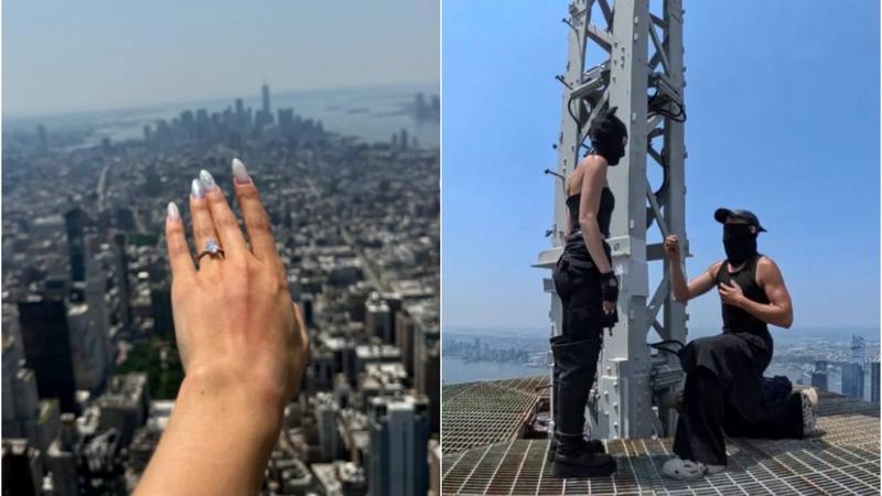  (VIDEO) Cerere în căsătorie pe antena Empire State Building. Un cuplu de acrobați ruși a fost încătușat imediat după coborâre