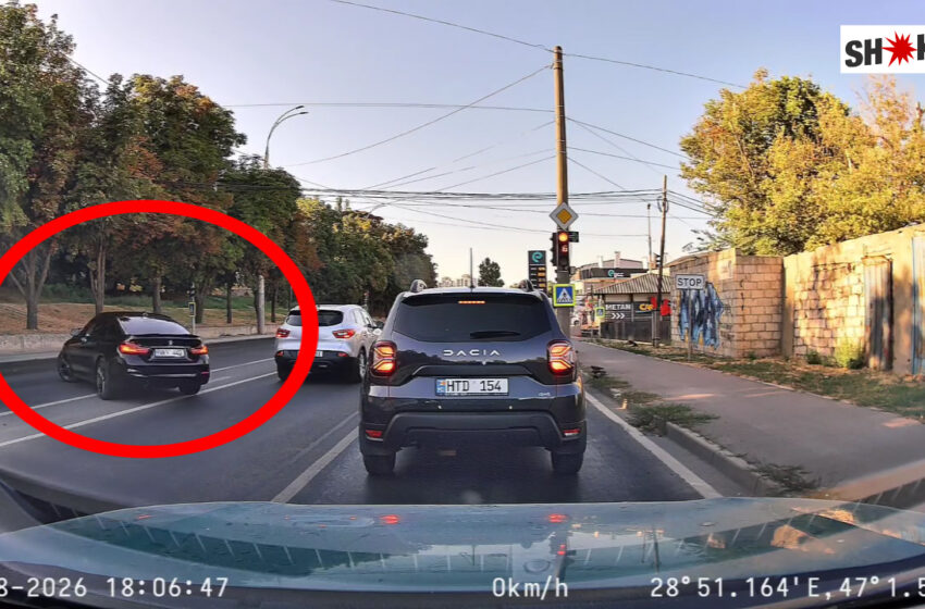  (VIDEO) Manevră periculoasă surprinsă pe Albișoara: Un BMW a trecut peste banda de separare pentru a fenta semaforul
