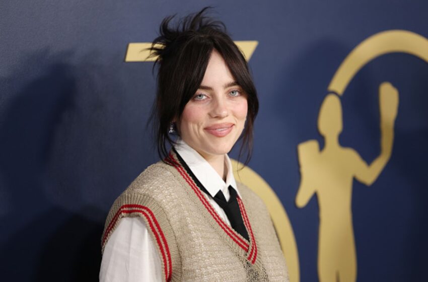  (FOTO) Billie Eilish, de nerecunoscut pe platourile de filmare. Transformarea spectaculoasă pentru primul său rol major într-un film