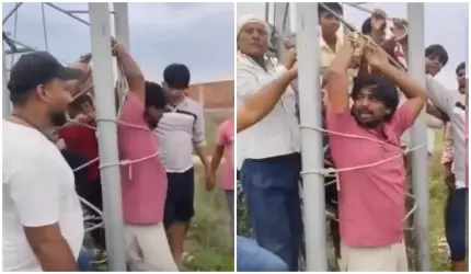  (VIDEO) Sătui de internetul prost, sătenii l-au legat de stâlp pe angajatul venit să verifice problema, în India