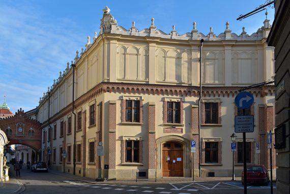 Exterior of Czartoryski Palace in Krakow, Poland, a large building with cream facades and brick detailing.