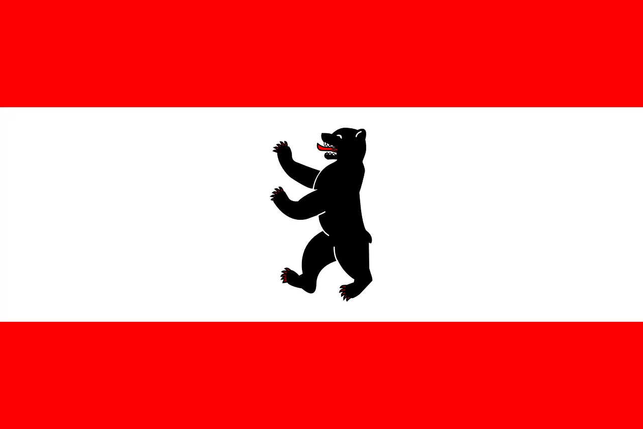 Flag of Berlin with the black Berlin Bear (Bär) on a white horizontal stripe between two red horizontal stripes.