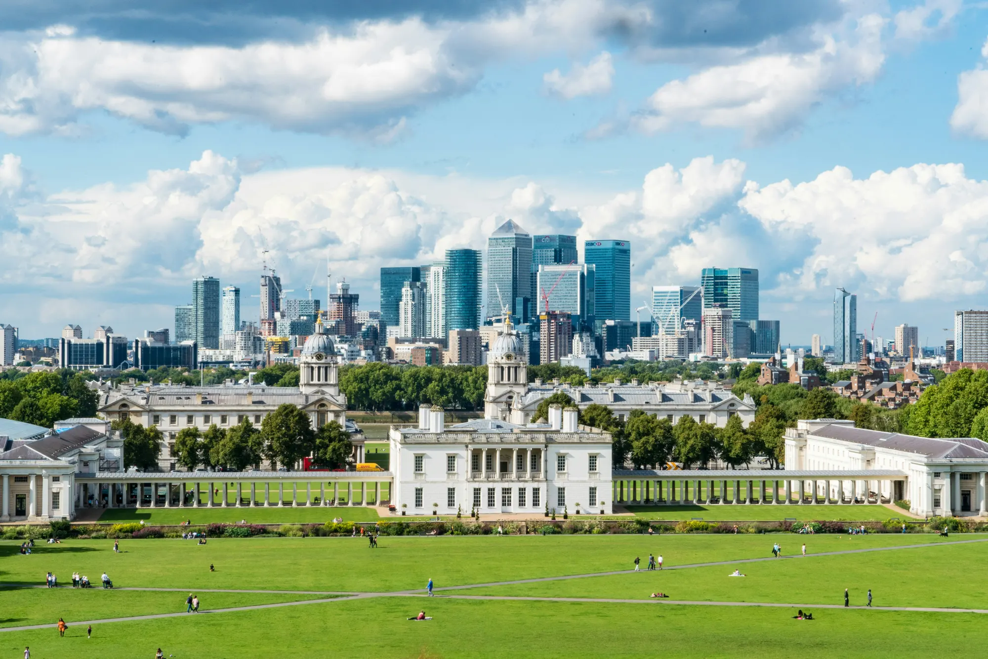View from Greenwich Park towards the Queen's House and the modern skyscrapers of the Canary Wharf financial district in Lo...