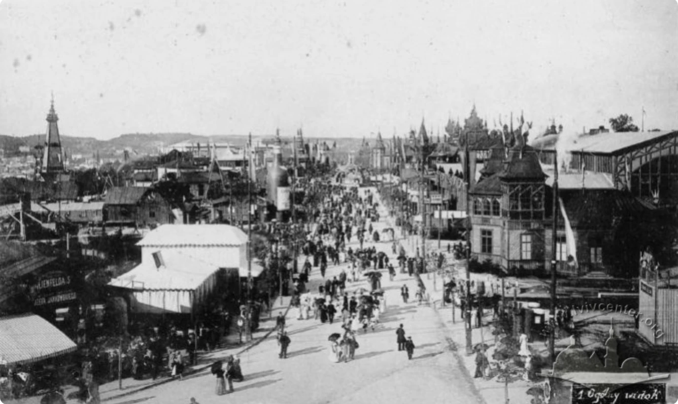 Historic black-and-white view of a crowded promenade with pavilions during the 1894 exhibition in Lviv.