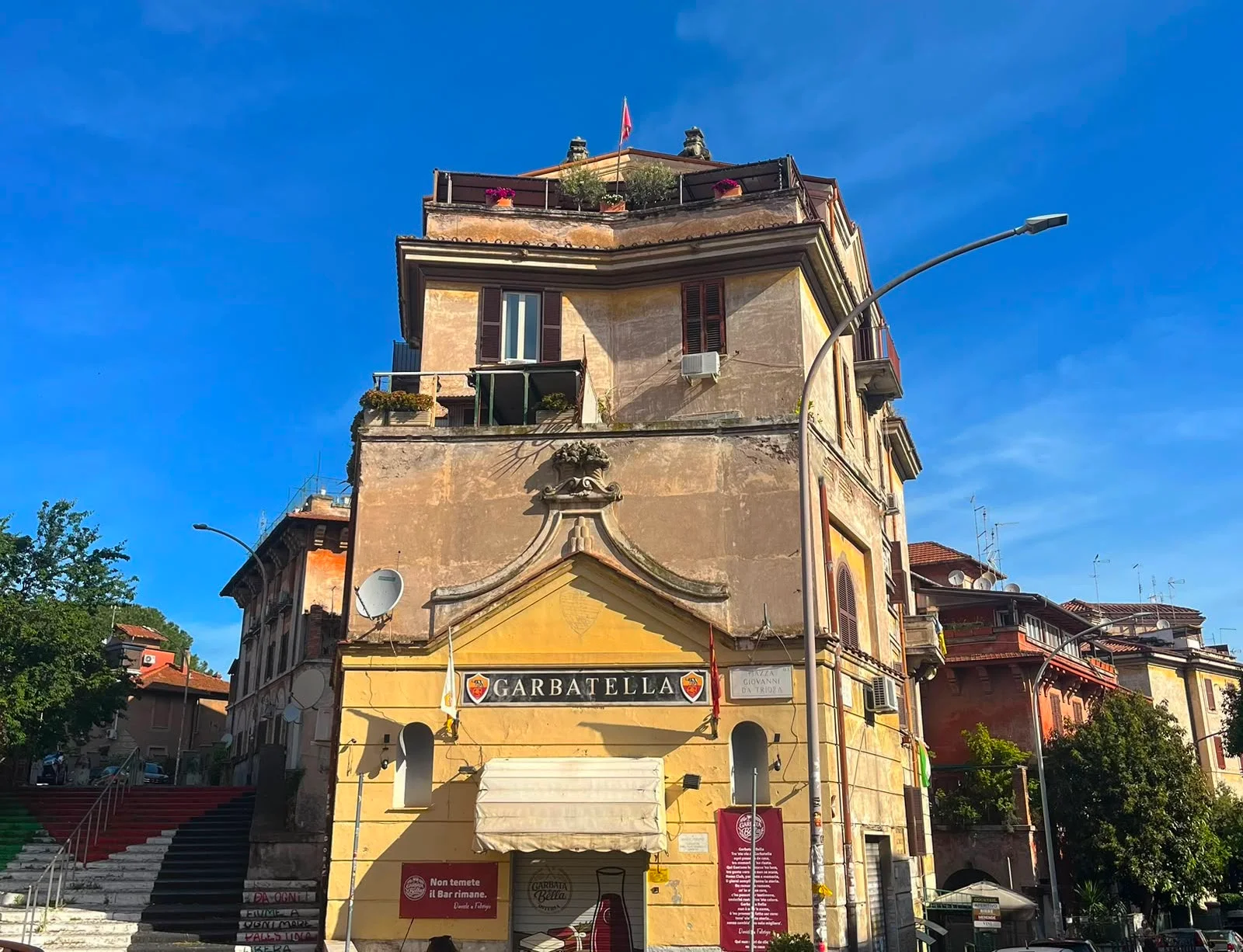 A legendary building of Bar dei Cesaroni at Piazza Giovanni da Triora 6 in Garbatella