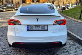 Tesla, Y performance