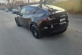 Tesla, Y performance