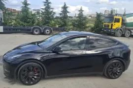 Tesla, Y performance