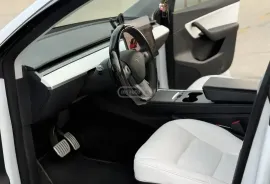 Tesla, Y performance