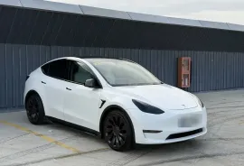 Tesla, Y performance