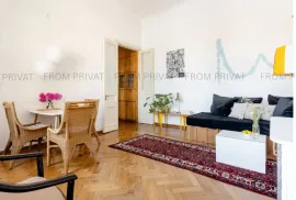 living room with A/C and gas heater