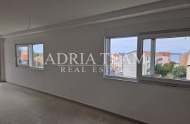 APARTMANI U STAMBENIM ZGRADAMA, NOVOGRADNJA, 150 m OD MORA - PRIVLAKA, Privlaka, Wohnung