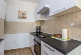 OTOK KRK, NJIVICE - Kuća s apartmanima i poslovnim prostorom, Omišalj, Maison