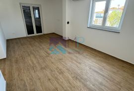 Medulin, NOVOGRADNJA/USELJIVO, dvosoban stan na I. katu + garaža, Medulin, Appartement