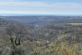 ISTRA, BUJE - Građevinsko zemljište s otvorenim pogledom na more i građevinskom dozvolom, Buje, Tierra