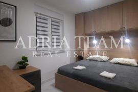 APARTMAN U NOVOGRADNJI, POGLED NA MORE, VRT 240 m2 - POVLJANA, PAG, Povljana, Appartement