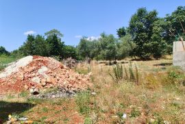 Istra, Marčana - Građevinsko zemljište 974m2 i roh bau kuća, Marčana, Tierra