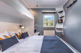 OPATIJA, LOVRAN- apartmanska zgrada od 700m2 s bazenom + 6000m2 zemljišta s građevnom dozvolom za wellness resort s 28 soba, Lovran, Σπίτι