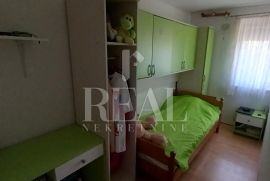 Prodaja kuće u nizu s garažom  u Kostelju P+1  108 m2, Crikvenica, Casa