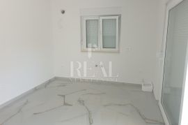 RAB-NOVOGRADNJA, 1S+DB OD 47 m2, PARKING, Rab, Apartamento