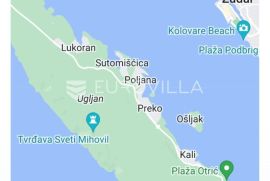 Zadar, otok Ugljan, građevinsko zemljište površine 1015 m2 uz more, Preko, Γη