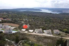 Parcela sa građevinskom dozvolom i plaćenim komunalijama, Labin, Zemljište