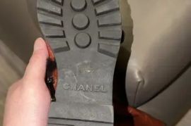 Chanel Quilted Fur Double-Buckle Moto Boots