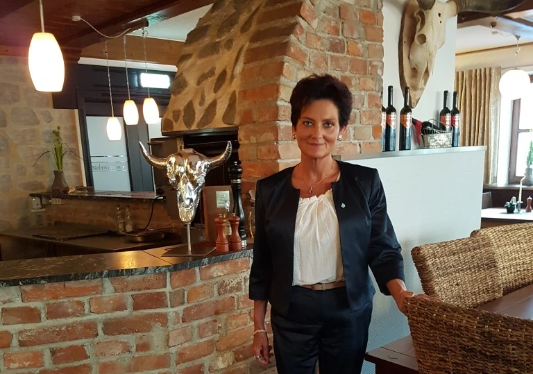 Porträtaufnahme von Frau Knoll, Geschäftsführendes Vorstandsmitglied der Baugenossenschaft Plattling eG